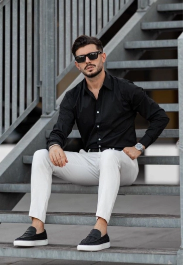 Black shirt paired with white pants
