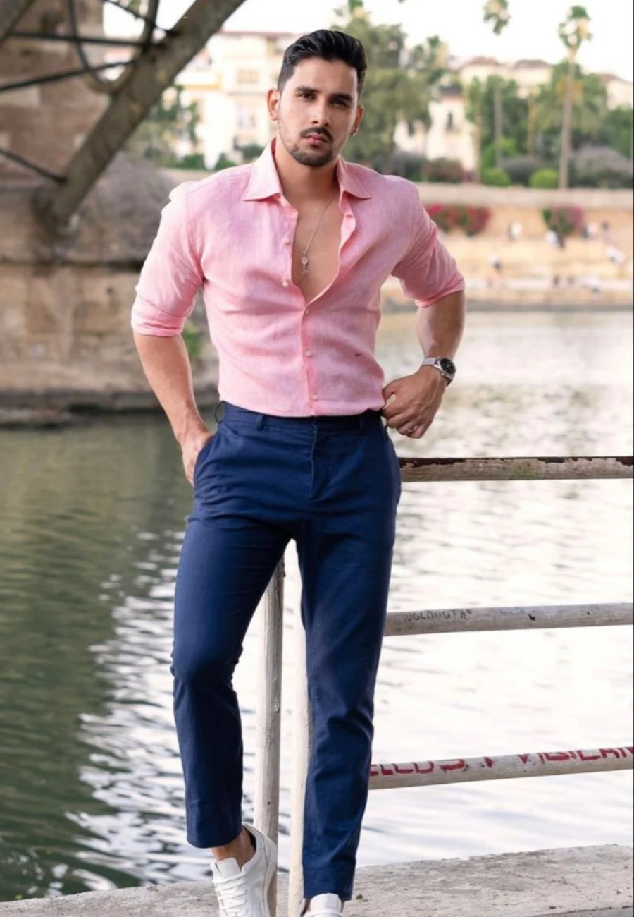 Pink shirt with navy blue trousers