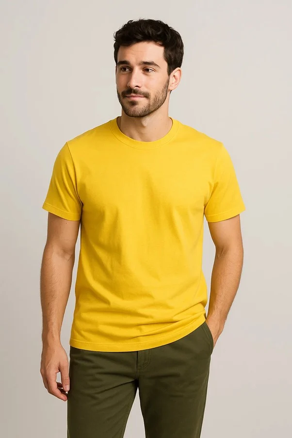 Man wearing yellow t-shirt and olive pants