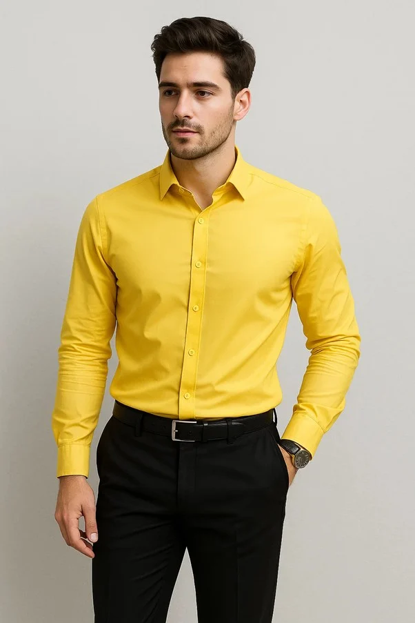 Man wearing yellow shirt black trousers