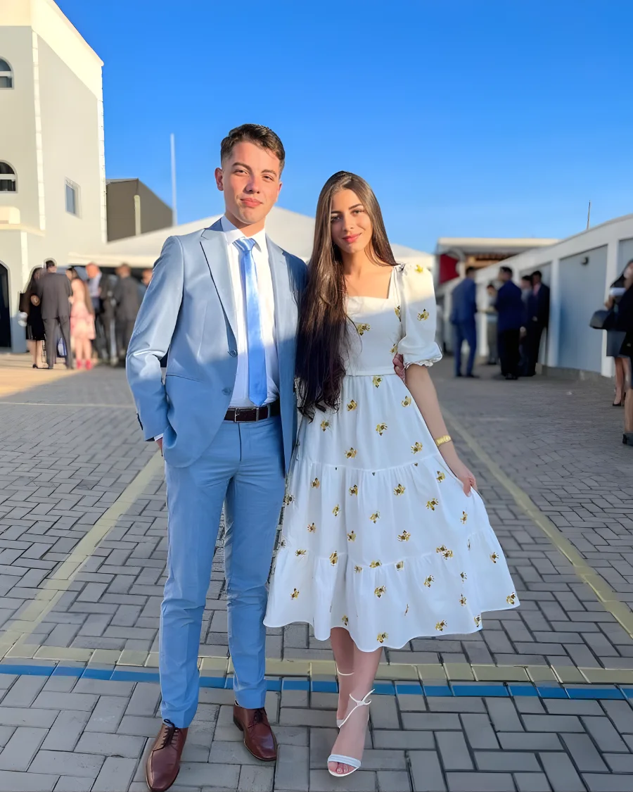 Couple dressed elegantly for special event.