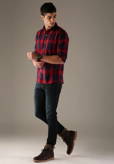 Black Jeans Paired With Flannel Shirt